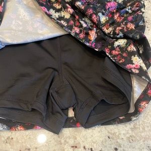 Multi colored pinks/ black tennis skirt from Fila